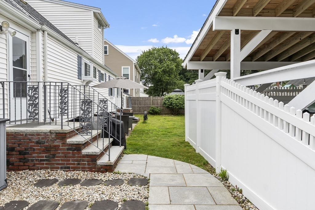 18 Rainbow Circle Peabody, MA 01960 - Photo 29 of 39 a view of a backyard with sitting area