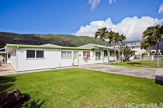 266 Kuliouou Road Honolulu, HI 96821 - Photo 1 of 1 a view of a house with a swimming pool