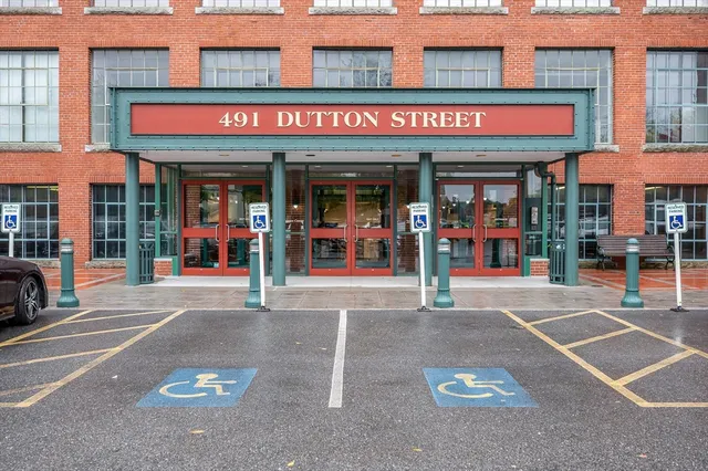 a view of a building with sitting area
