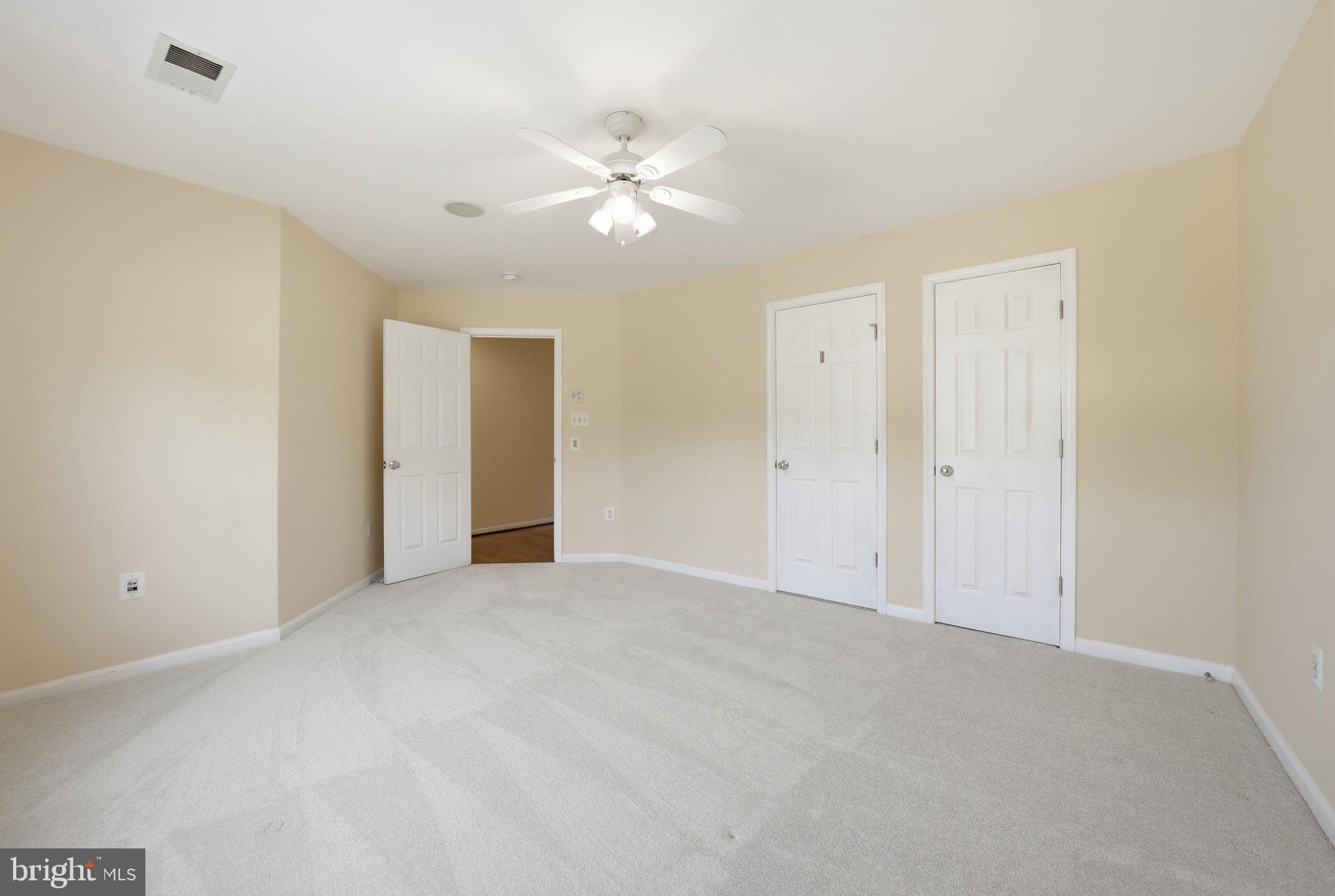 3679 Expedition Drive Triangle, VA 22172 - Photo 22 of 65 a view of an empty room with a fan