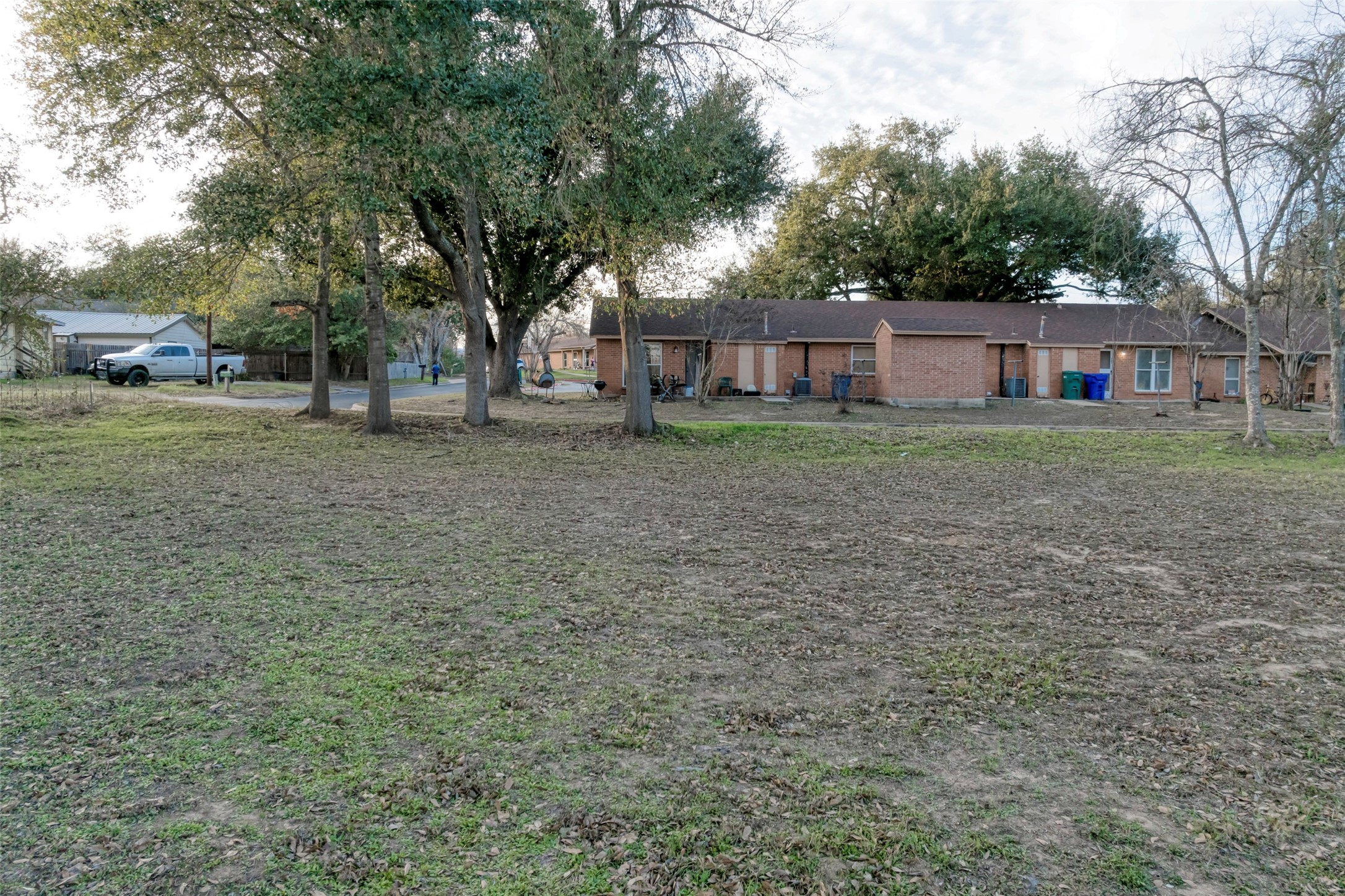 Lot 4 East Alamo Street Elgin, TX 78621 - Photo 5 of 14 a view of a house with a yard