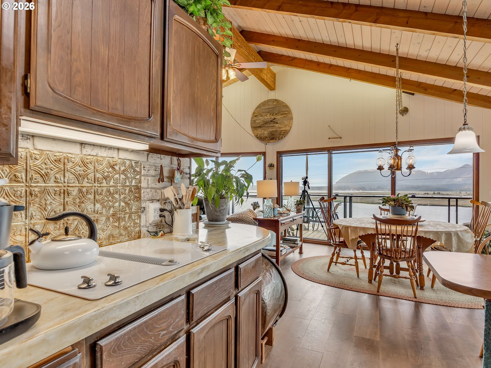 61 Gamble Street Wheeler, OR 97147 - Photo 11 of 45 a kitchen with a table and chairs