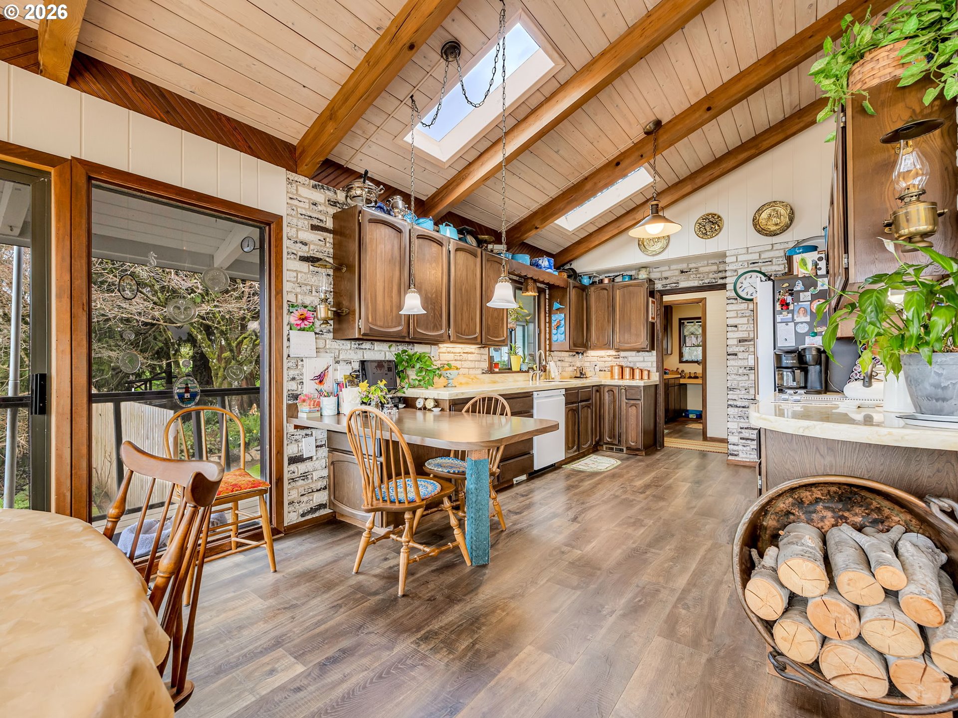 61 Gamble Street Wheeler, OR 97147 - Photo 16 of 45 a living room filled with furniture and a large window