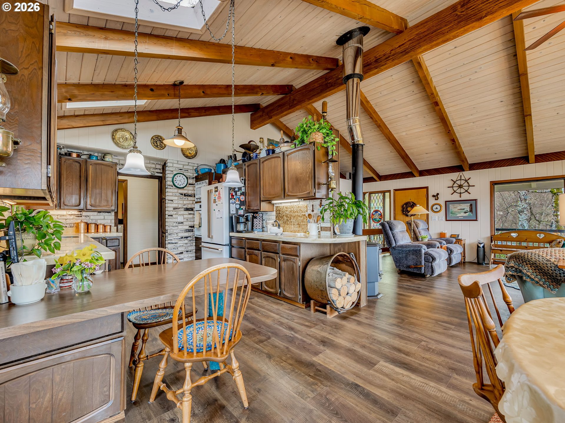 61 Gamble Street Wheeler, OR 97147 - Photo 17 of 45 a view of a porch with furniture and stove