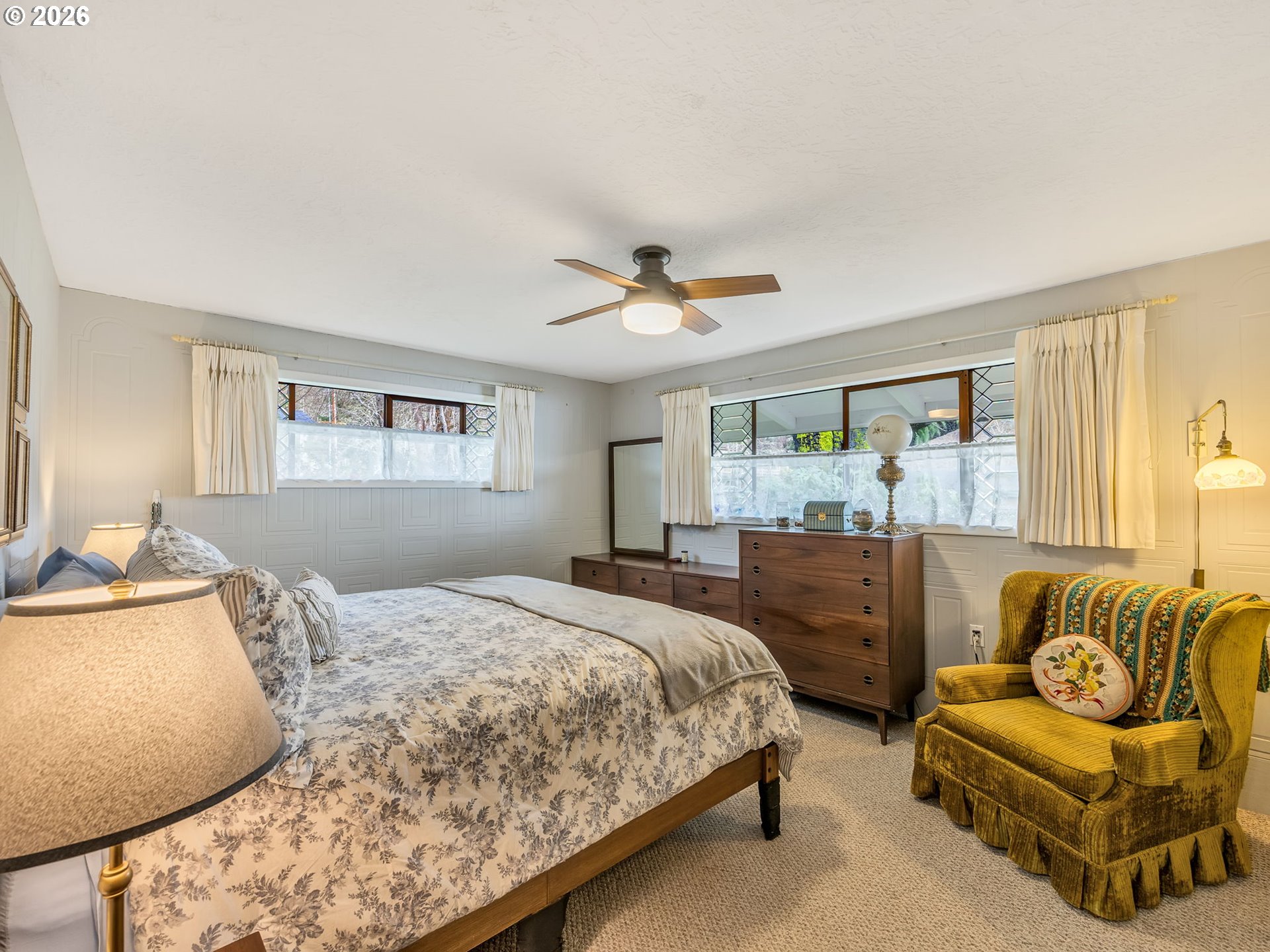 61 Gamble Street Wheeler, OR 97147 - Photo 22 of 45 a bedroom with a bed and a couch