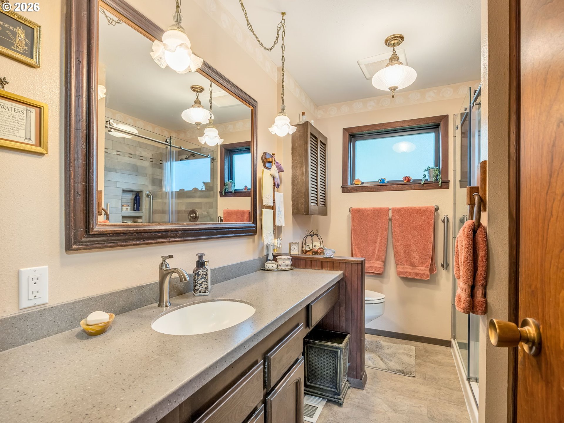 61 Gamble Street Wheeler, OR 97147 - Photo 25 of 45 a bathroom with a granite countertop sink and a mirror