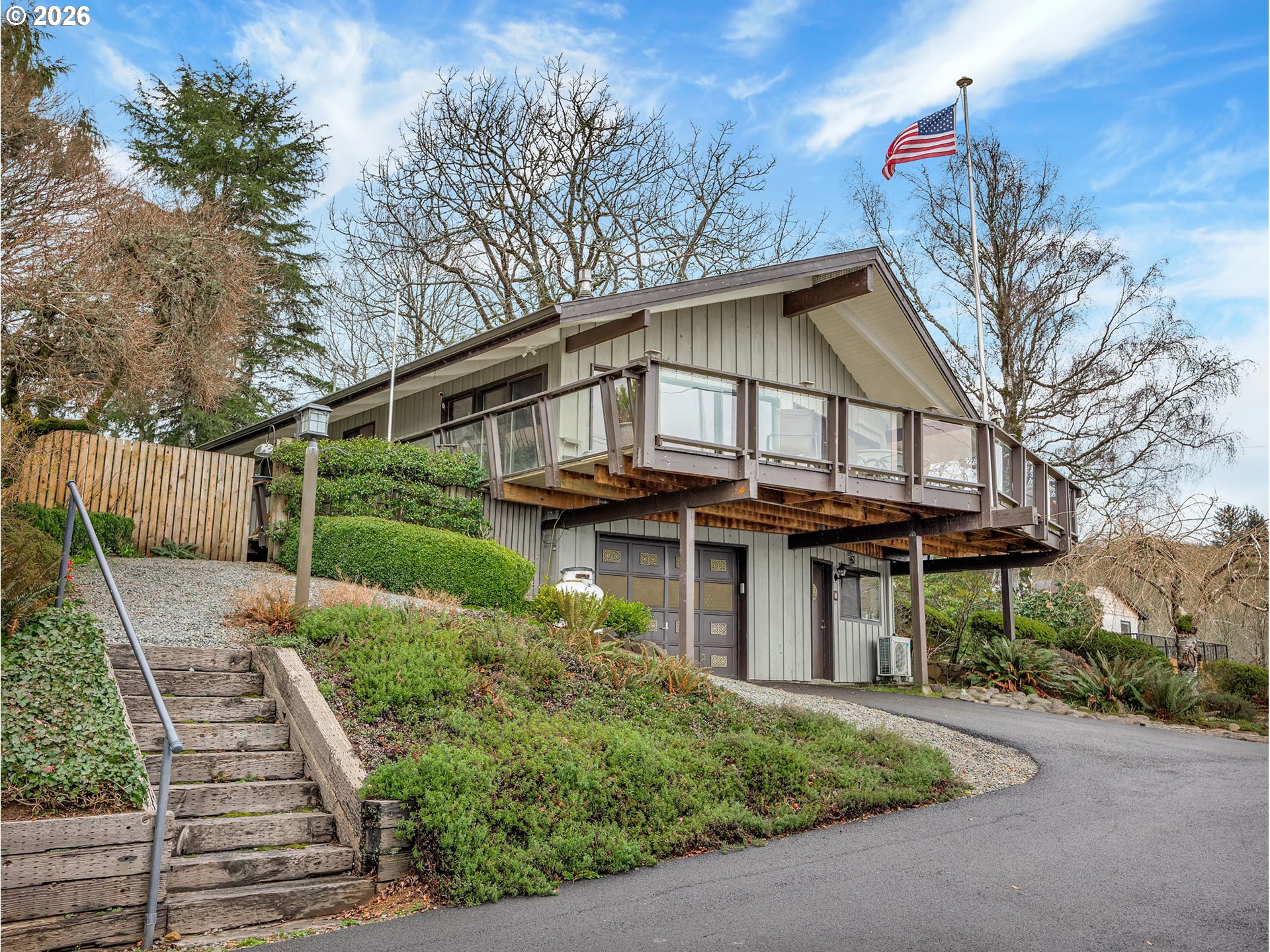 61 Gamble Street Wheeler, OR 97147 - Photo 3 of 45 a front view of a house with garden