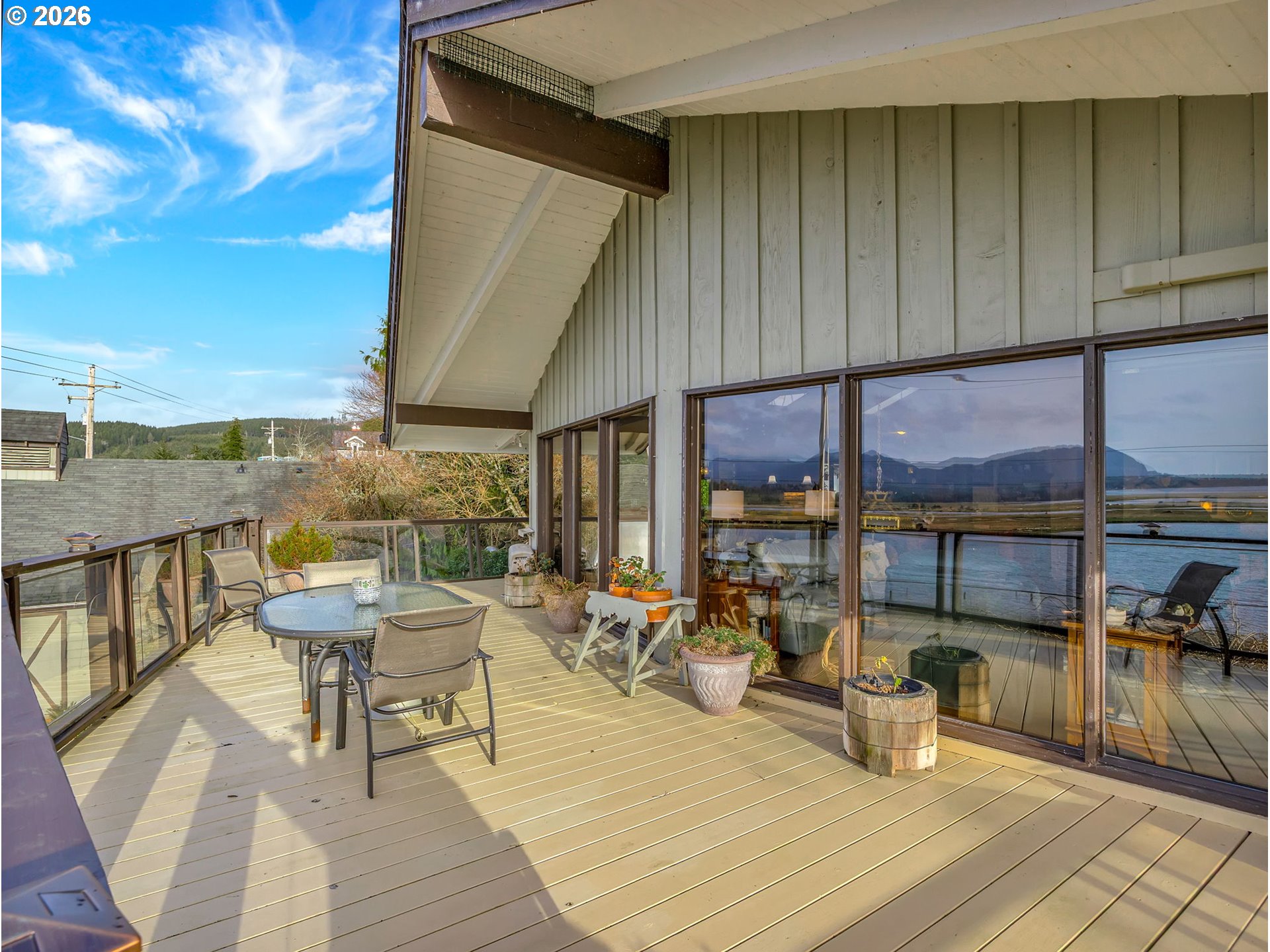 61 Gamble Street Wheeler, OR 97147 - Photo 35 of 45 a view of a swimming pool with outdoor seating