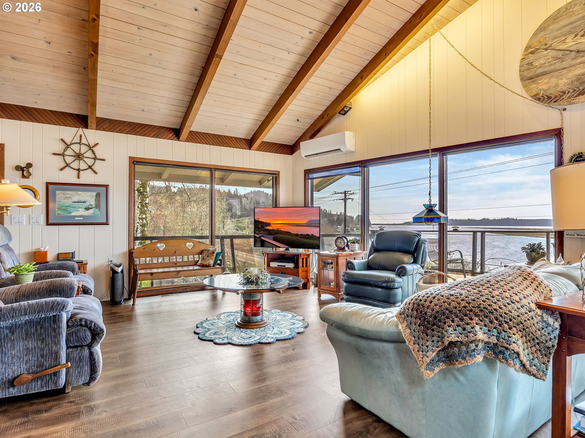 61 Gamble Street Wheeler, OR 97147 - Photo 6 of 45 a living room with furniture fireplace and wooden floor