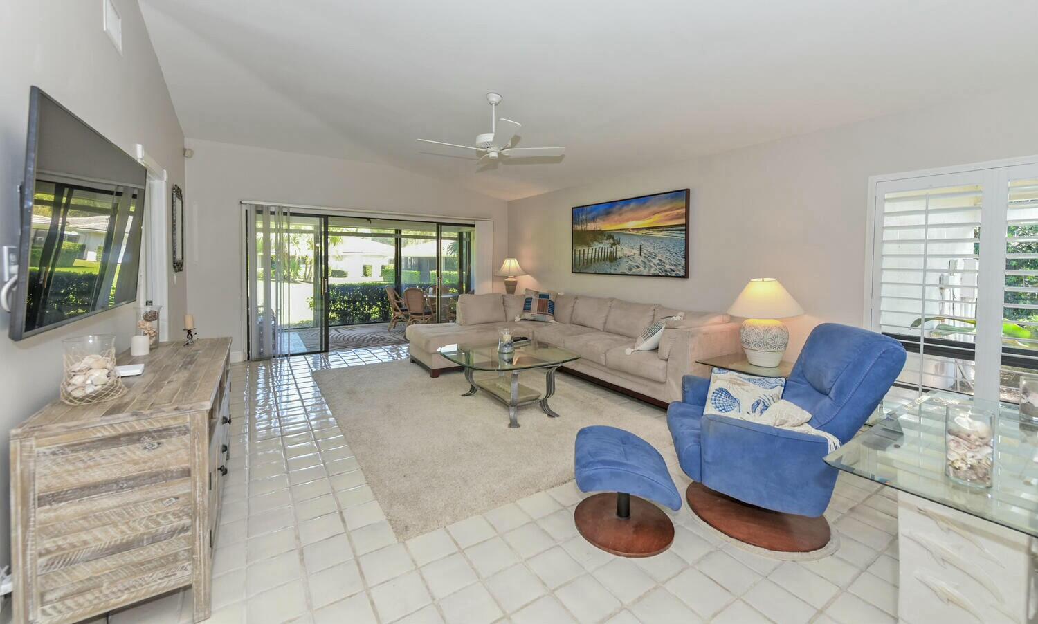 3736 Freshwater Drive Jupiter, FL 33477 - Photo 11 of 28 a living room with furniture and wooden floor