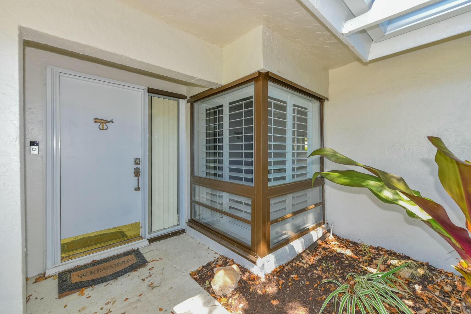 3736 Freshwater Drive Jupiter, FL 33477 - Photo 21 of 28 a view of bedroom with a bed and a window