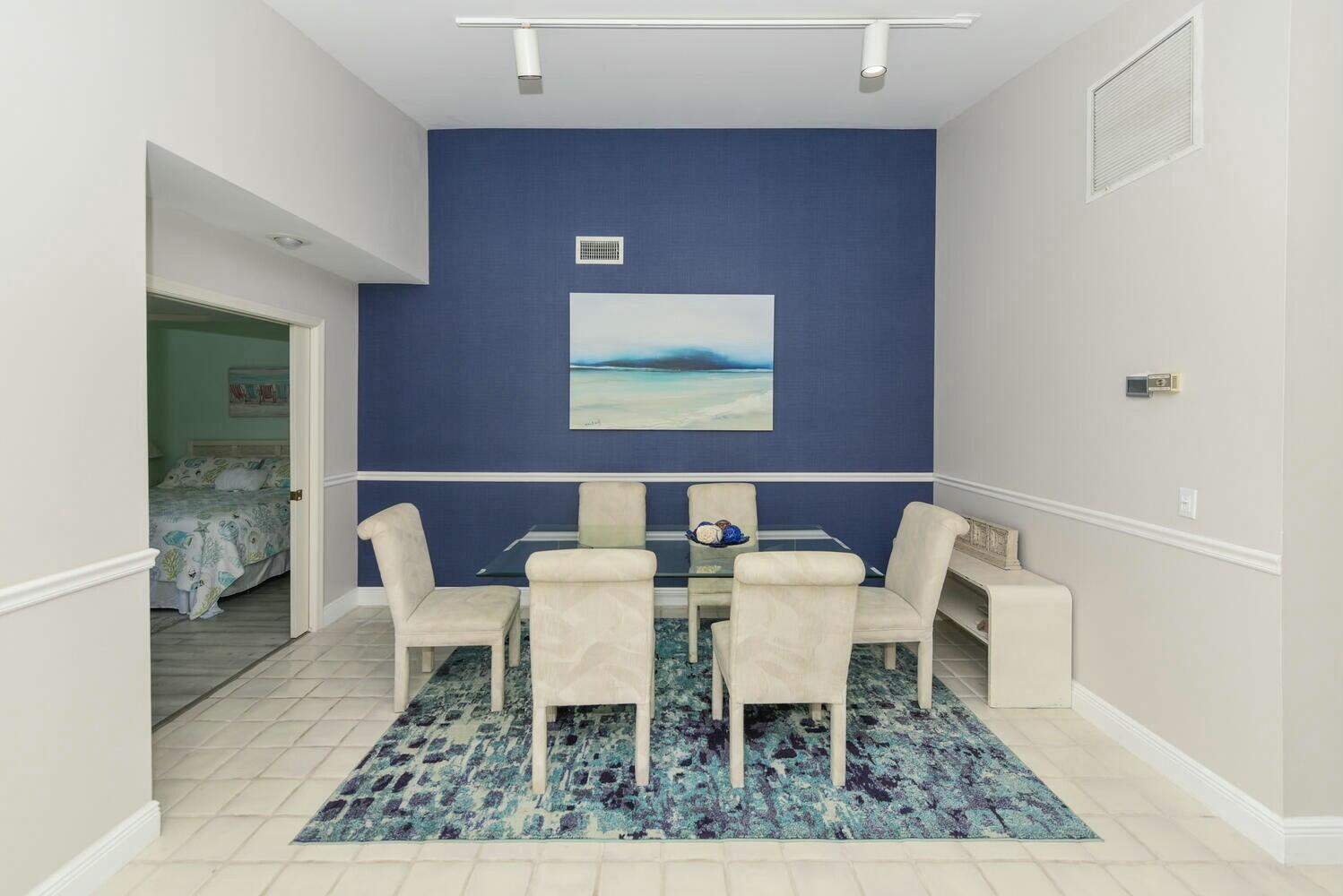 3736 Freshwater Drive Jupiter, FL 33477 - Photo 4 of 28 a view of a dining room with furniture