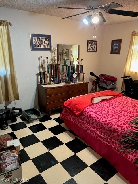 1691 North Hermitage Road Fort Myers, FL 33919 - Photo 11 of 15 a bedroom with a bed and a mirror on the dresser