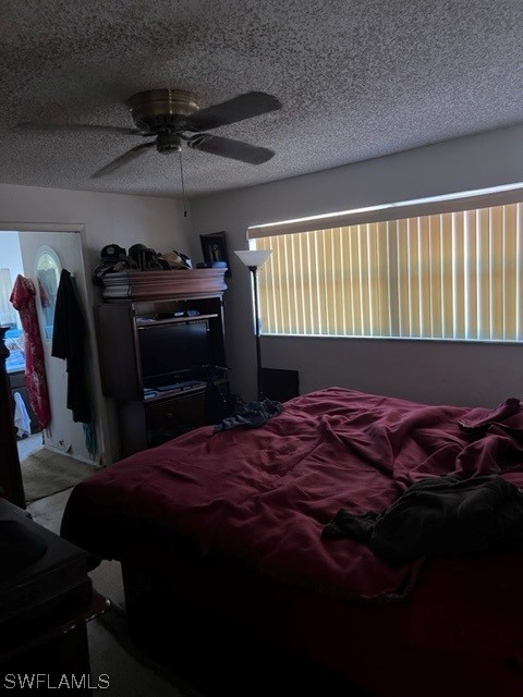 1691 North Hermitage Road Fort Myers, FL 33919 - Photo 12 of 15 a bed sitting in a bedroom next to a window