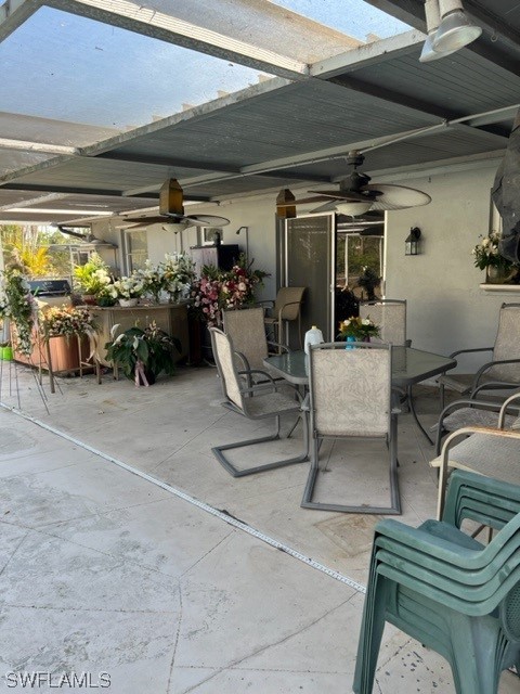 1691 North Hermitage Road Fort Myers, FL 33919 - Photo 14 of 15 a view of a patio with table and chairs