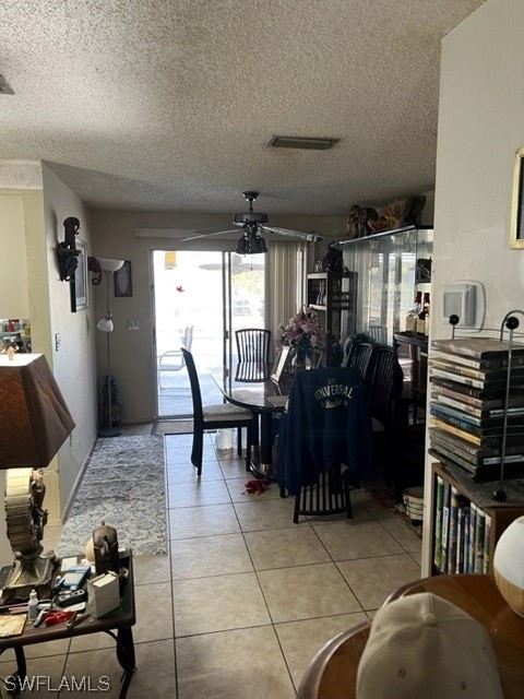 1691 North Hermitage Road Fort Myers, FL 33919 - Photo 5 of 15 a living room with furniture a chandelier and a dining table