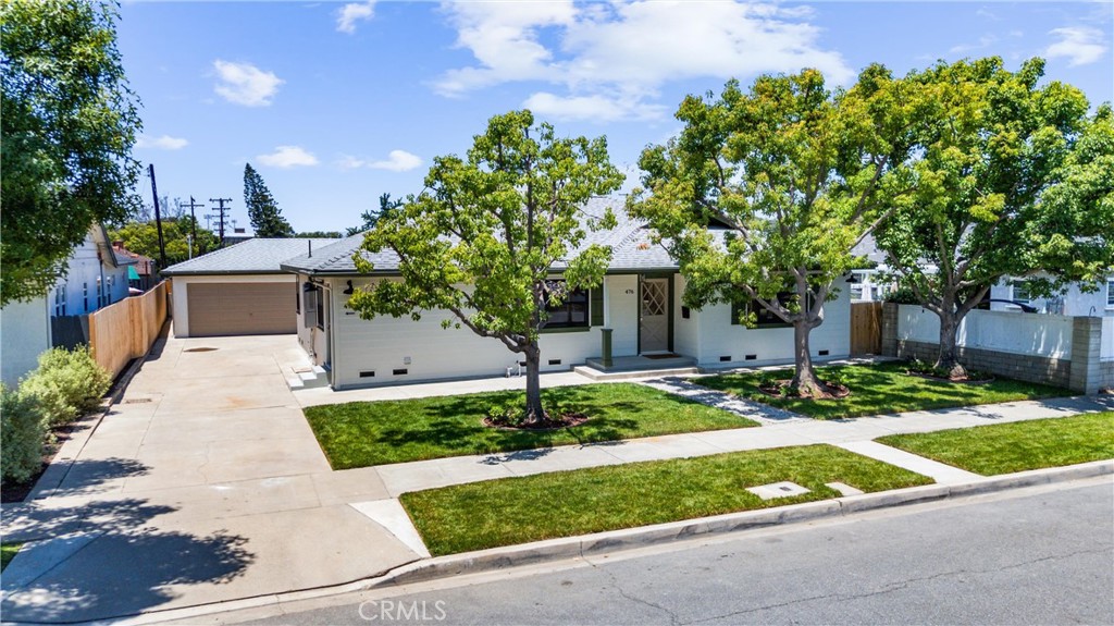 476 North Pine Street Orange, CA 92866 - Photo 2 of 5 a front view of a house with garden