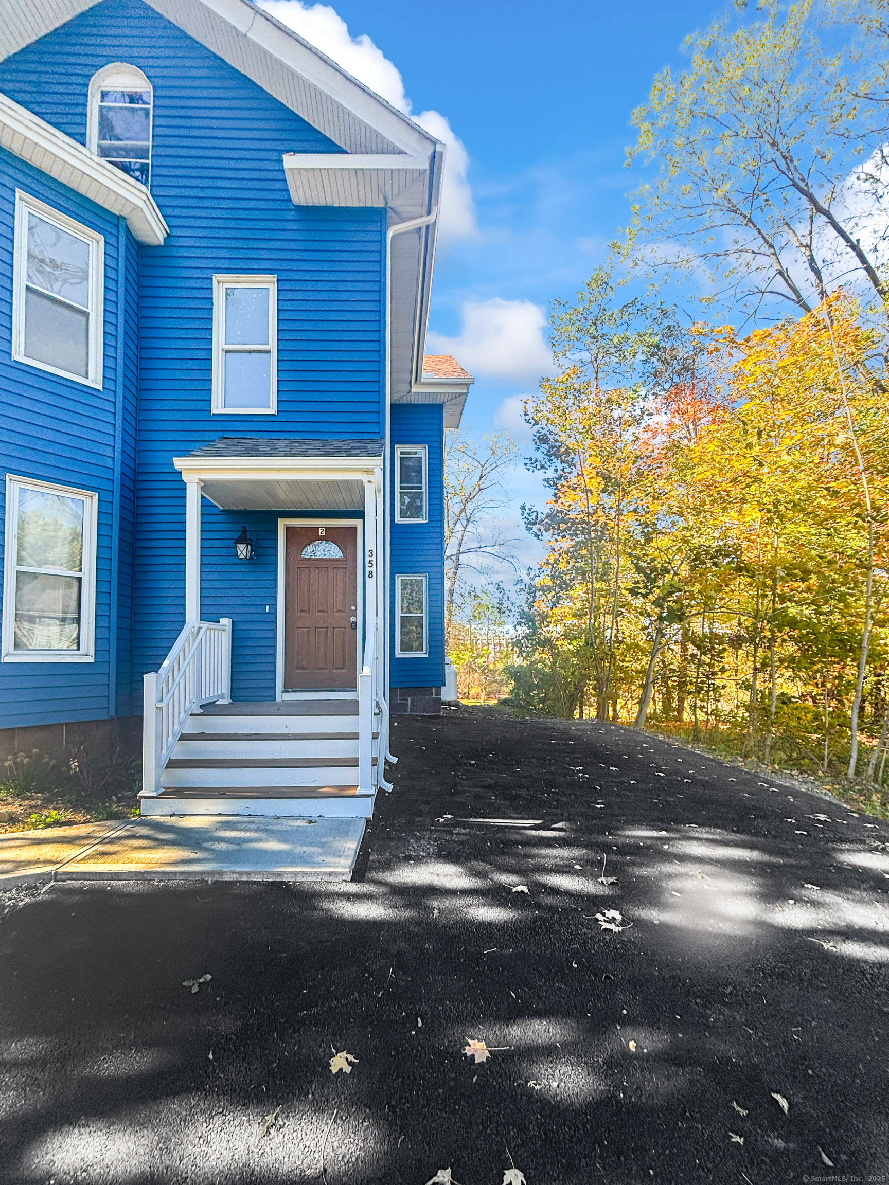 358 Pomeroy Avenue Meriden, CT 06450 - Photo 2 of 36 a view of yellow house with a yard