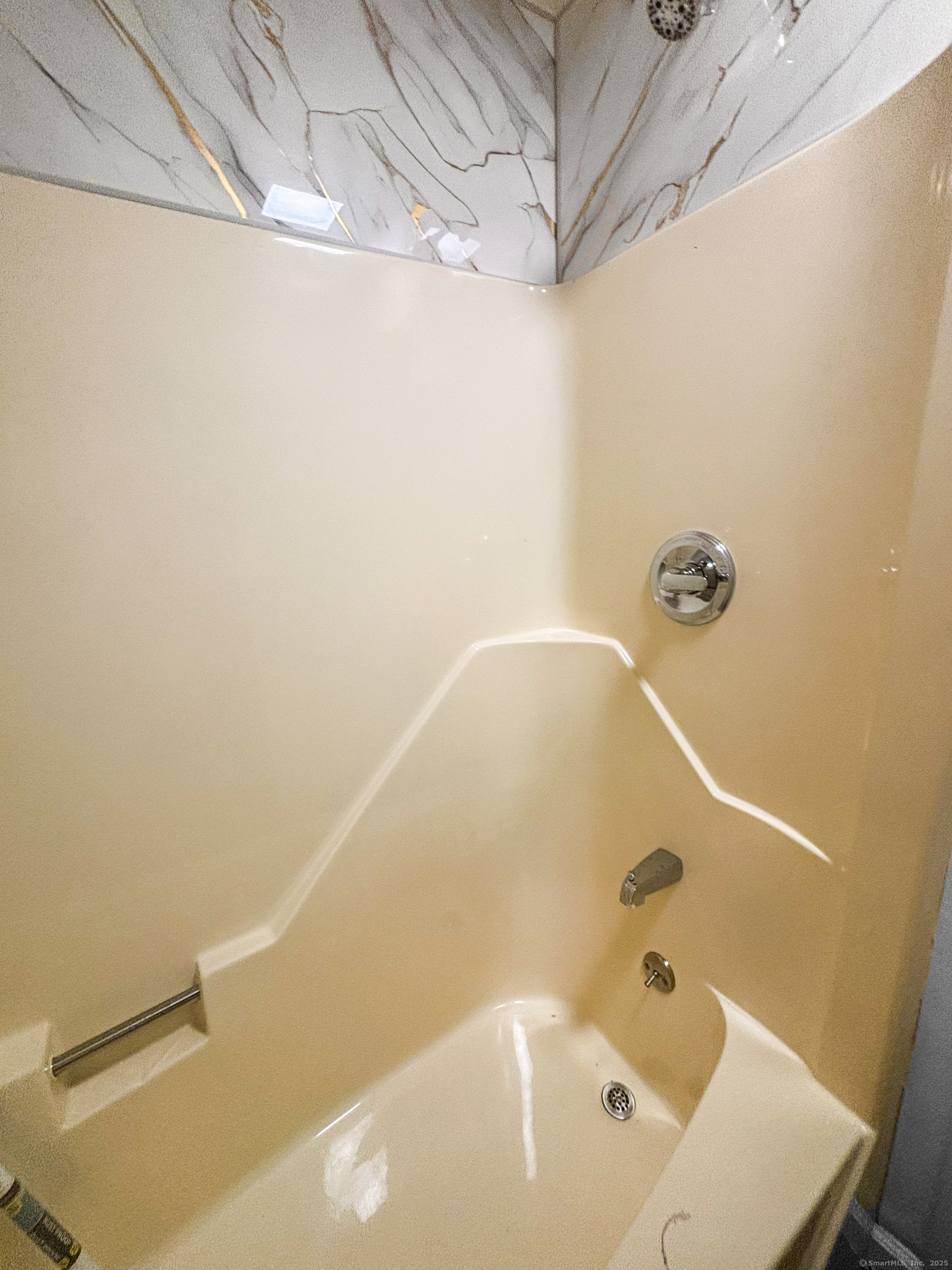 358 Pomeroy Avenue Meriden, CT 06450 - Photo 21 of 36 a bathroom with a white bath tub