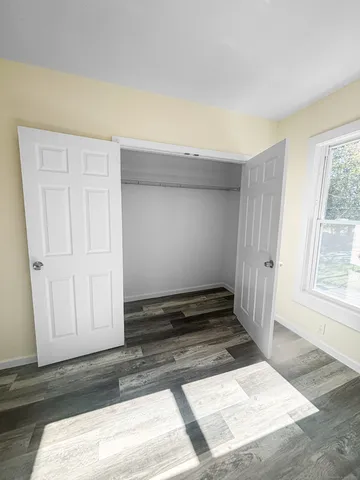 a view of an empty room and window