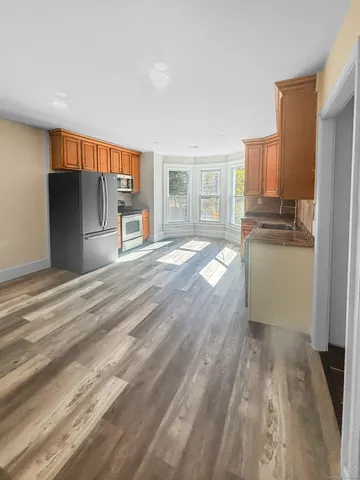 a view of a kitchen with a sink
