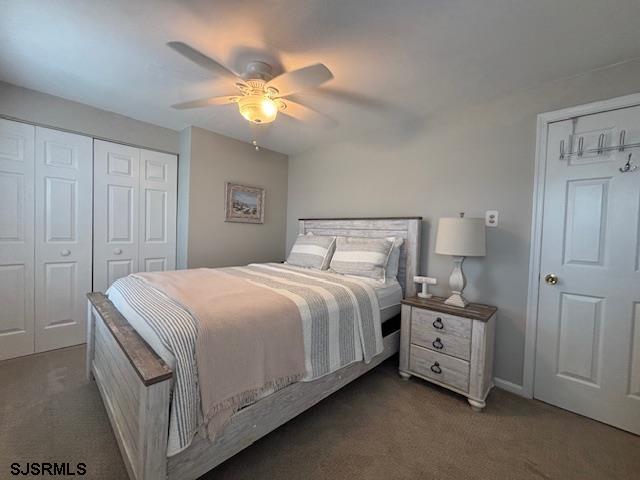1328 Ouimet Road Brigantine, NJ 08203 - Photo 19 of 33 a bedroom with a bed and a chandelier