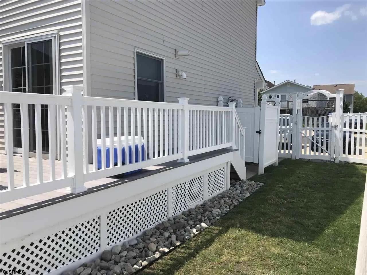 1328 Ouimet Road Brigantine, NJ 08203 - Photo 32 of 33 a view of a wooden fence from a backyard