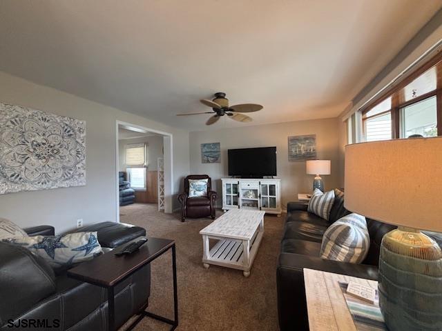 1328 Ouimet Road Brigantine, NJ 08203 - Photo 4 of 33 a living room with furniture and a flat screen tv