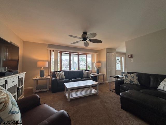 1328 Ouimet Road Brigantine, NJ 08203 - Photo 5 of 33 a living room with furniture and a flat screen tv
