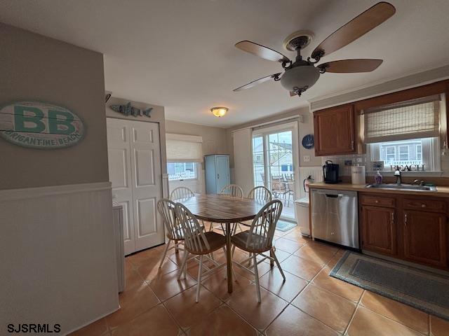 1328 Ouimet Road Brigantine, NJ 08203 - Photo 6 of 33 a view of a kitchen with a table and a refrigerator