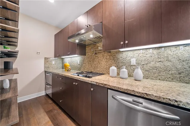 a spacious bathroom with a double vanity sink and a mirror