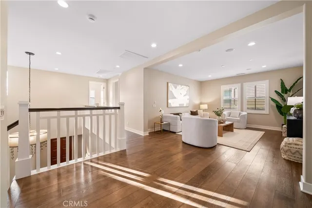 a spacious bathroom with a tub sink shower and mirror