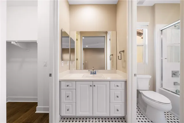 an aerial view of residential building and ocean