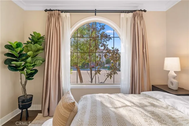 a bathroom with a double vanity sink toilet mirror and shower