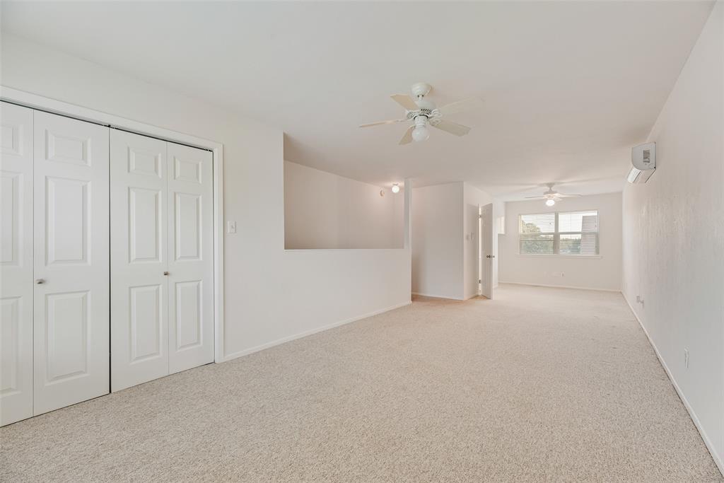 1017 Calcutta Street Hurst, TX 76053 - Photo 14 of 18 a view of an empty room with a bathroom