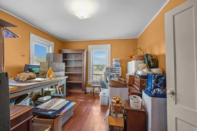 a kitchen with a refrigerator and a stove