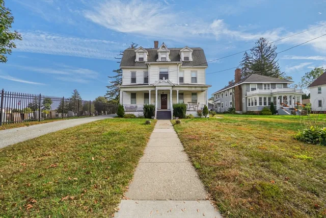 a view of a building with a garden