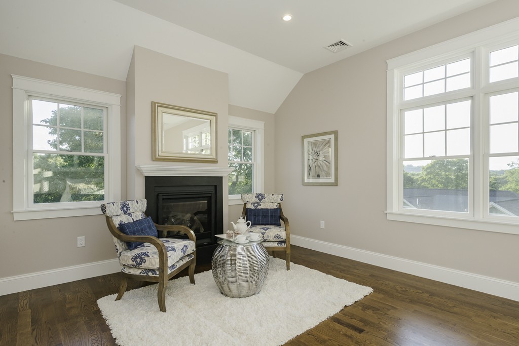 19 Hinds Road Winchester, MA 01890 - Photo 18 of 29 a living room with furniture a fireplace and window