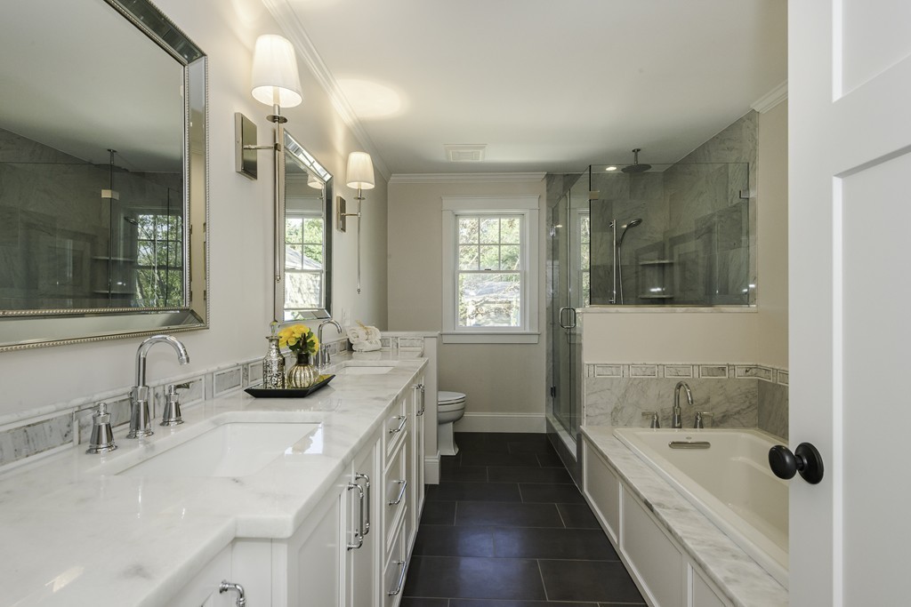 19 Hinds Road Winchester, MA 01890 - Photo 21 of 29 a bathroom with a tub sink and mirror