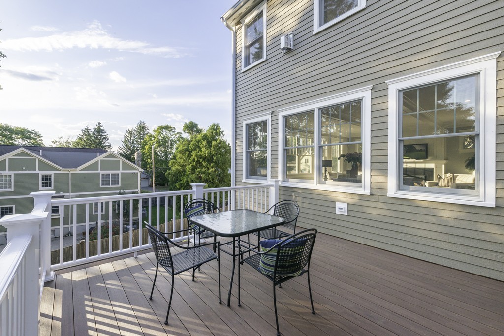 19 Hinds Road Winchester, MA 01890 - Photo 28 of 29 a view of a chair and table on the deck