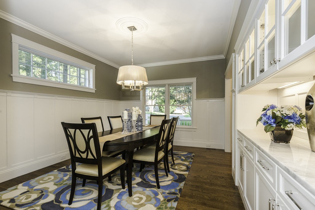 19 Hinds Road Winchester, MA 01890 - Photo 6 of 29 a view of a dining room with furniture a chandelier and wooden floor
