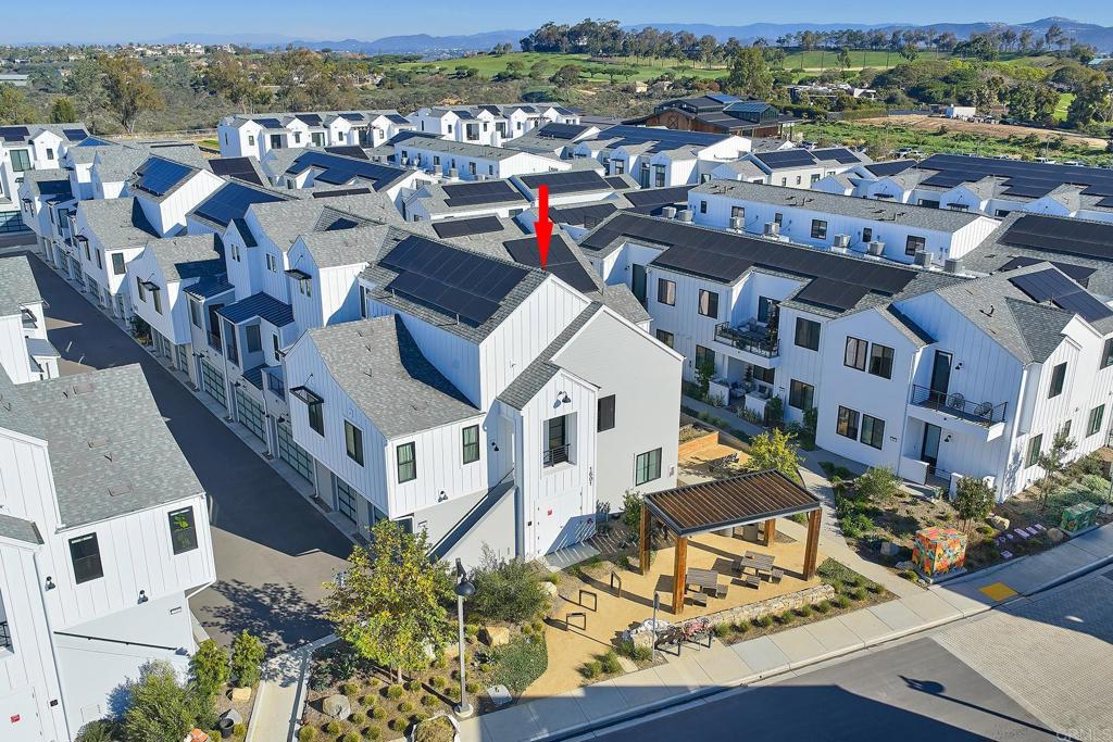 1601 San Remo Place, Unit 101 Encinitas, CA 92024 - Photo 20 of 27 an aerial view of residential houses with outdoor space