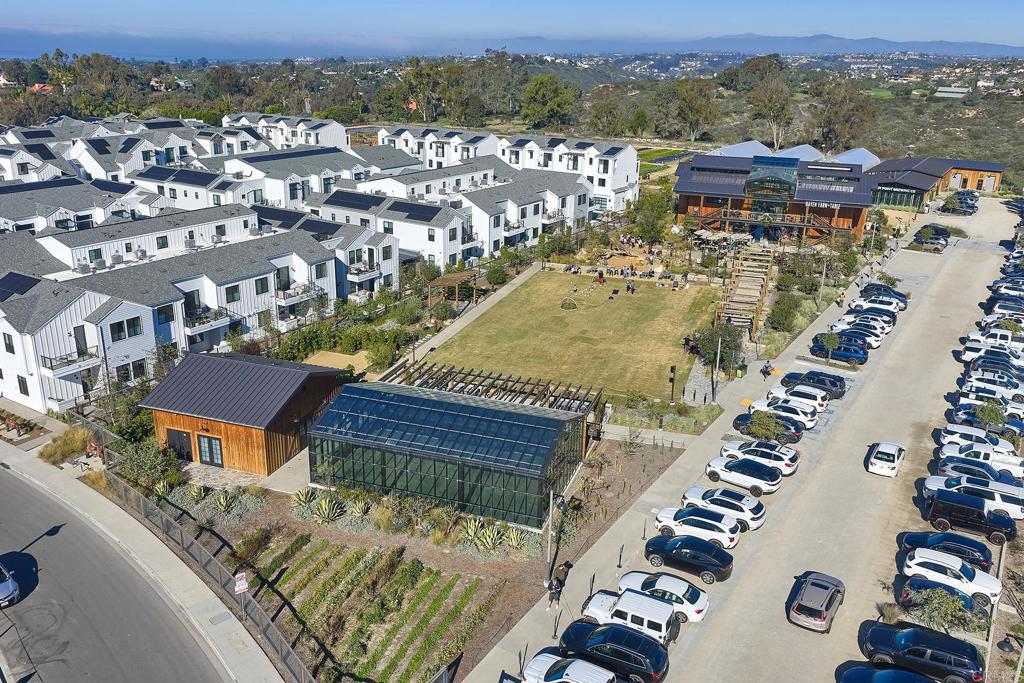 1601 San Remo Place, Unit 101 Encinitas, CA 92024 - Photo 23 of 27 an aerial view of residential houses with outdoor space