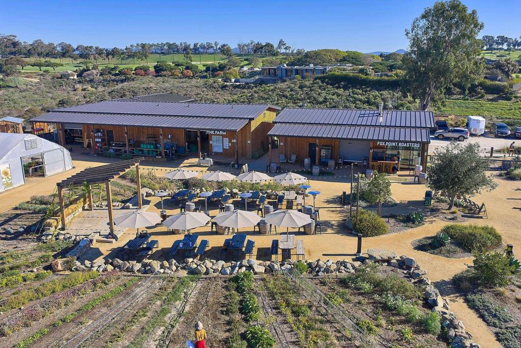 1601 San Remo Place, Unit 101 Encinitas, CA 92024 - Photo 24 of 27 an aerial view of a house with a garden