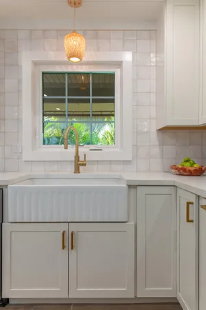 a bathroom with a sink and a window