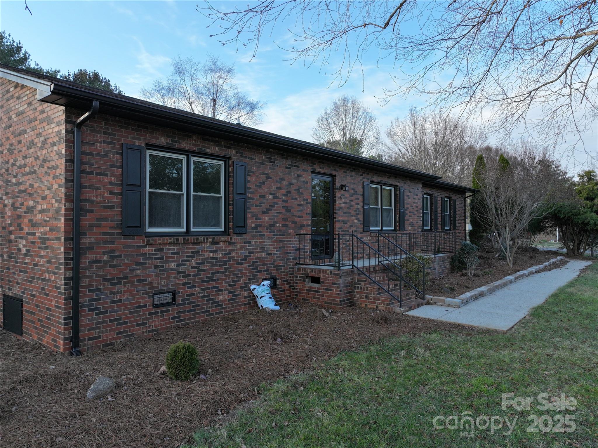 451 James Farm Road Statesville, NC 28625 - Photo 1 of 30 a backyard of a house with lots of green space