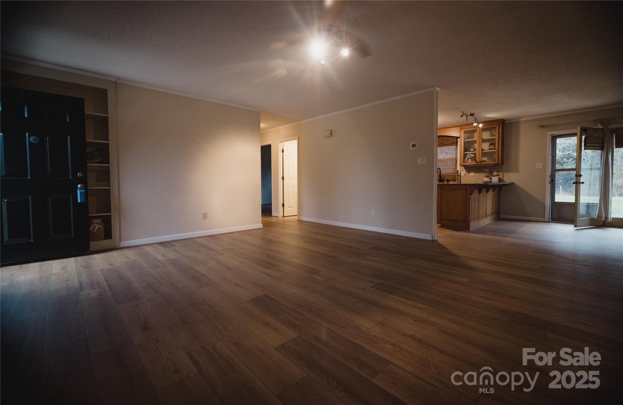 451 James Farm Road Statesville, NC 28625 - Photo 20 of 30 a view of empty room with wooden floor