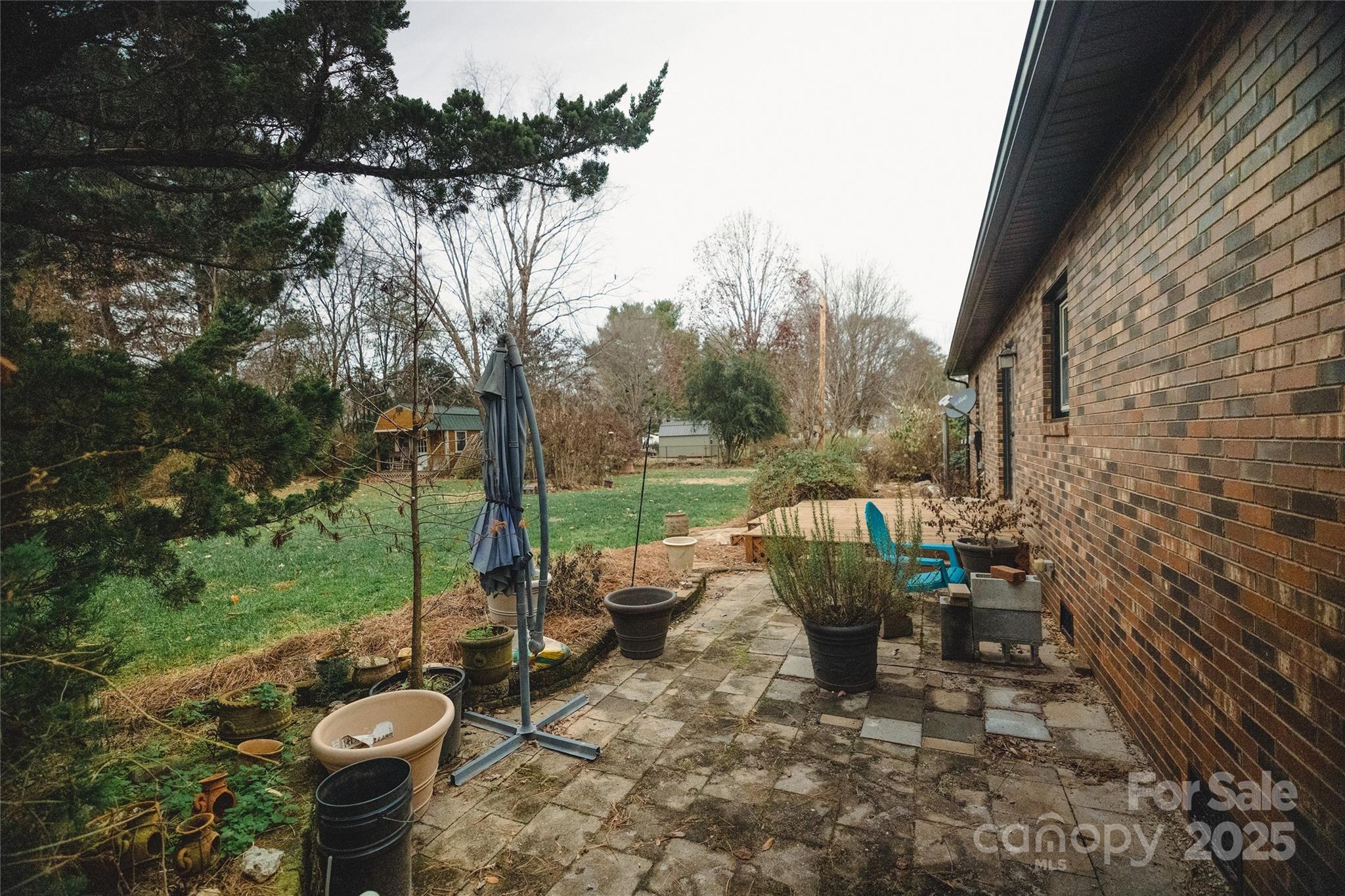 451 James Farm Road Statesville, NC 28625 - Photo 28 of 30 a view of a table and chairs in patio
