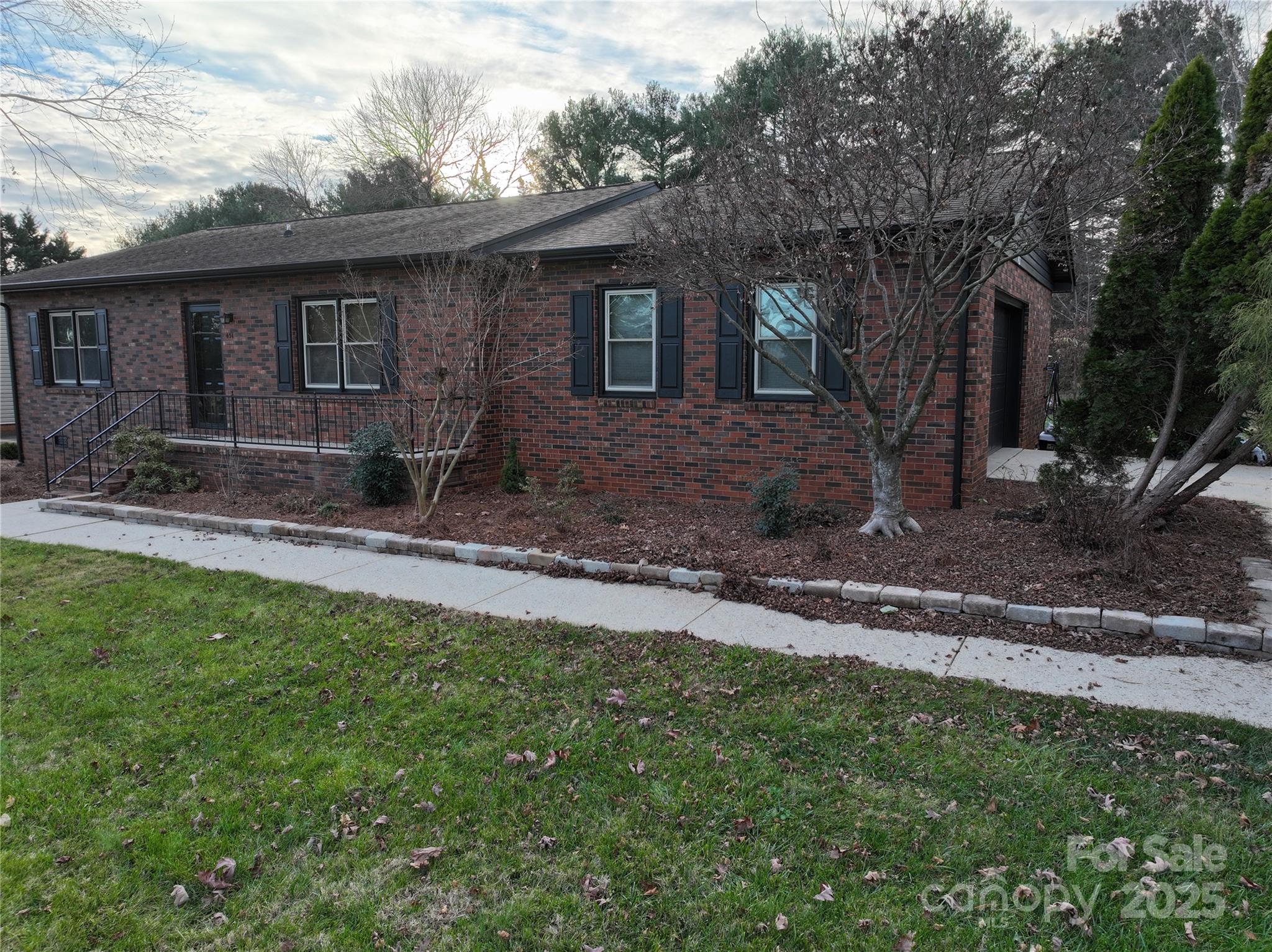 451 James Farm Road Statesville, NC 28625 - Photo 3 of 30 a backyard of a house with seating space