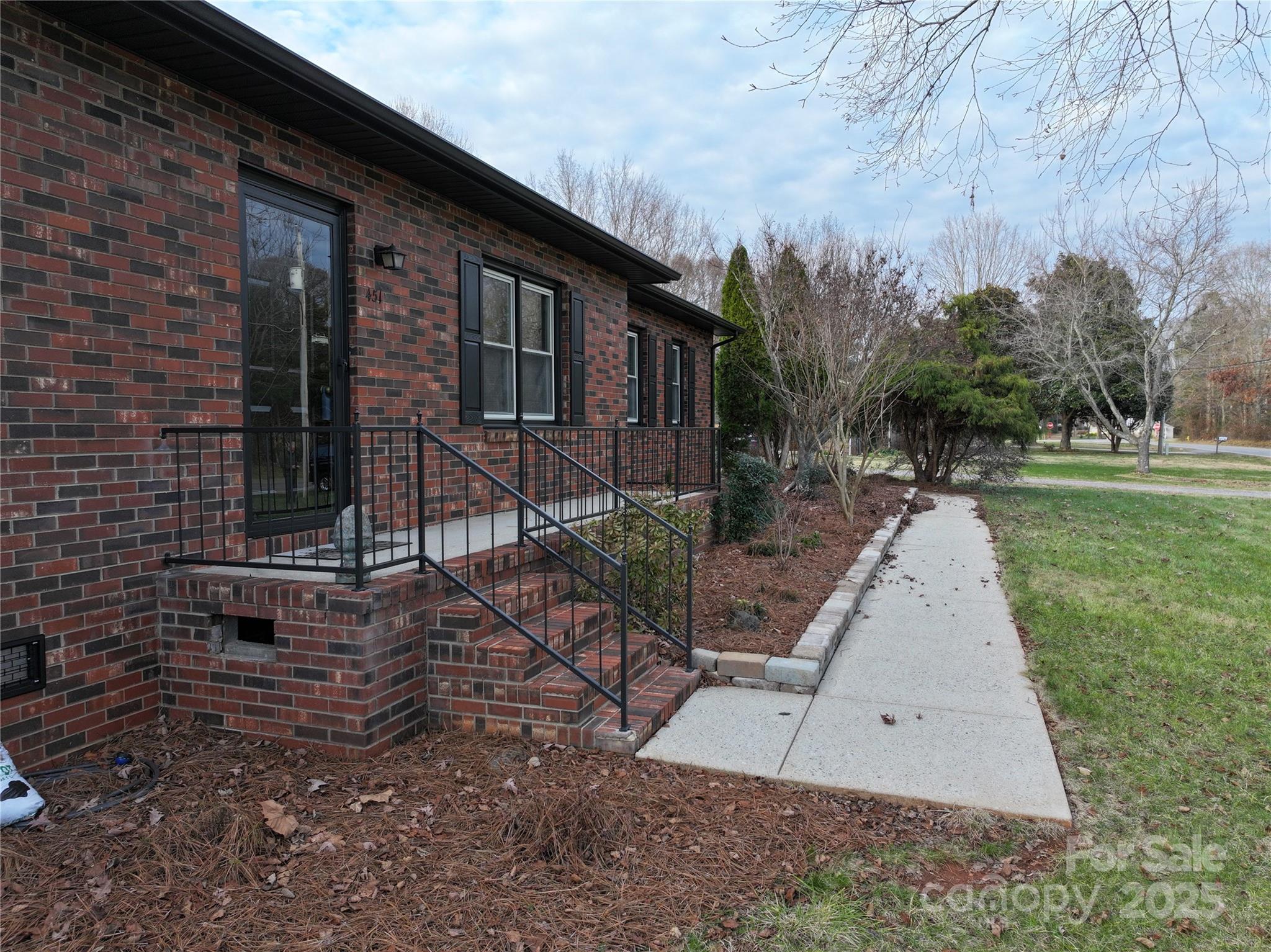 451 James Farm Road Statesville, NC 28625 - Photo 5 of 30 a view of a house with backyard and trees